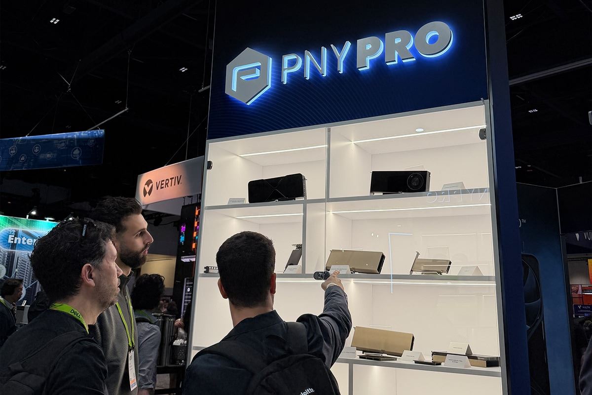 Attendees viewing PNY PRO products on display at a technology conference