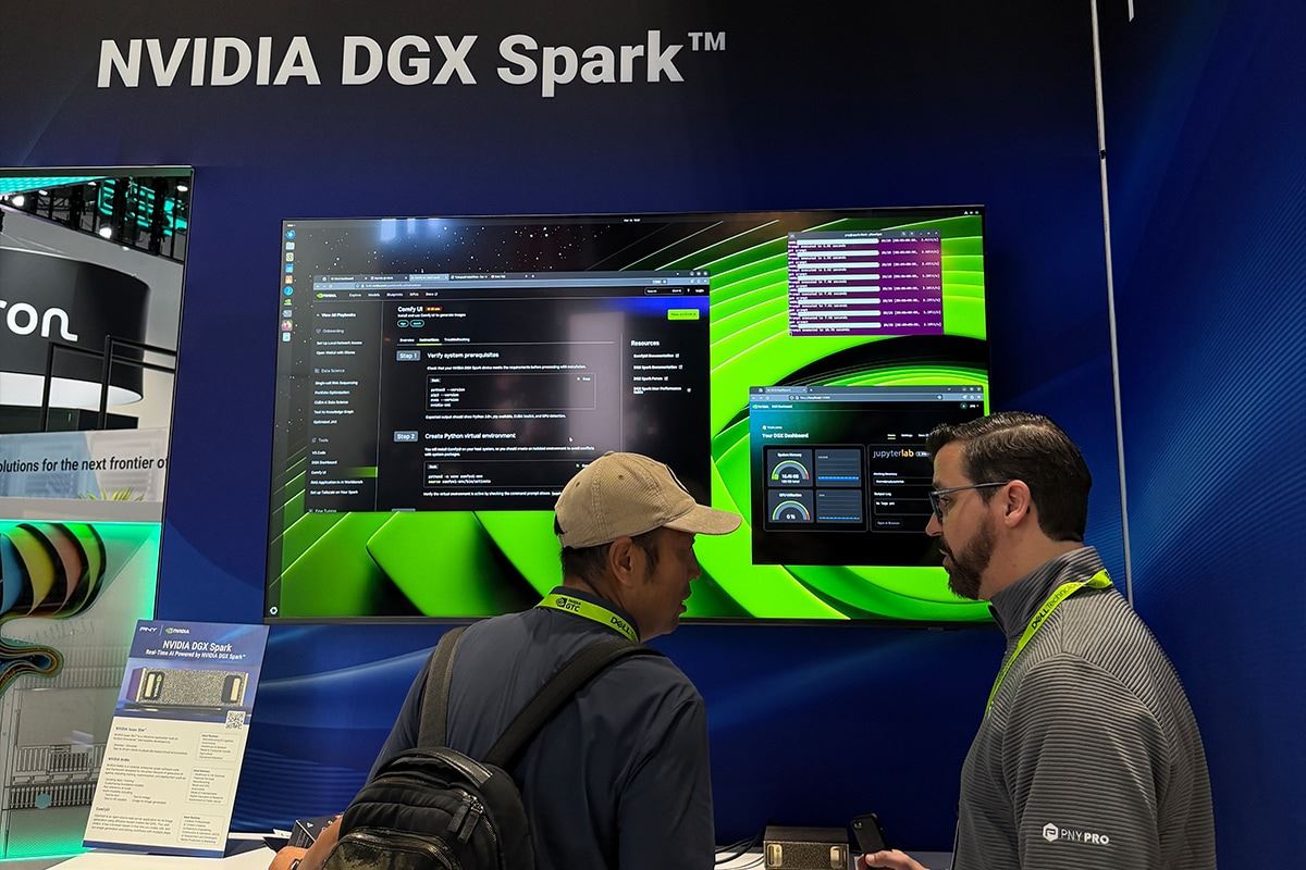 PNY representative demonstrating NVIDIA DGX Spark to a conference attendee
